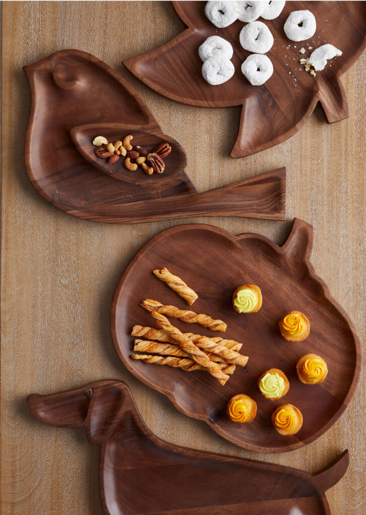 wooden trays of bird and pumpkin